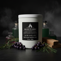 Noir Willow scented candle by Black Flamez in a moody black currant willow and cedar setting